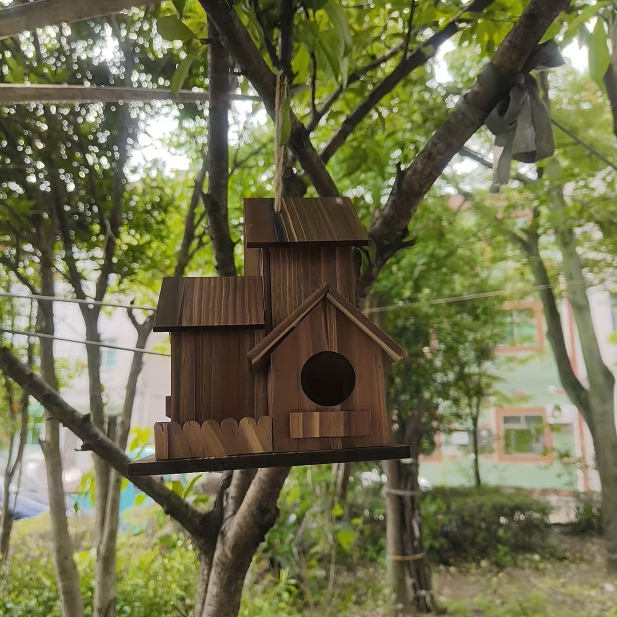 Rustic Solid Wood Birdhouse with Multiple Nesting Compartments for Outdoor Use