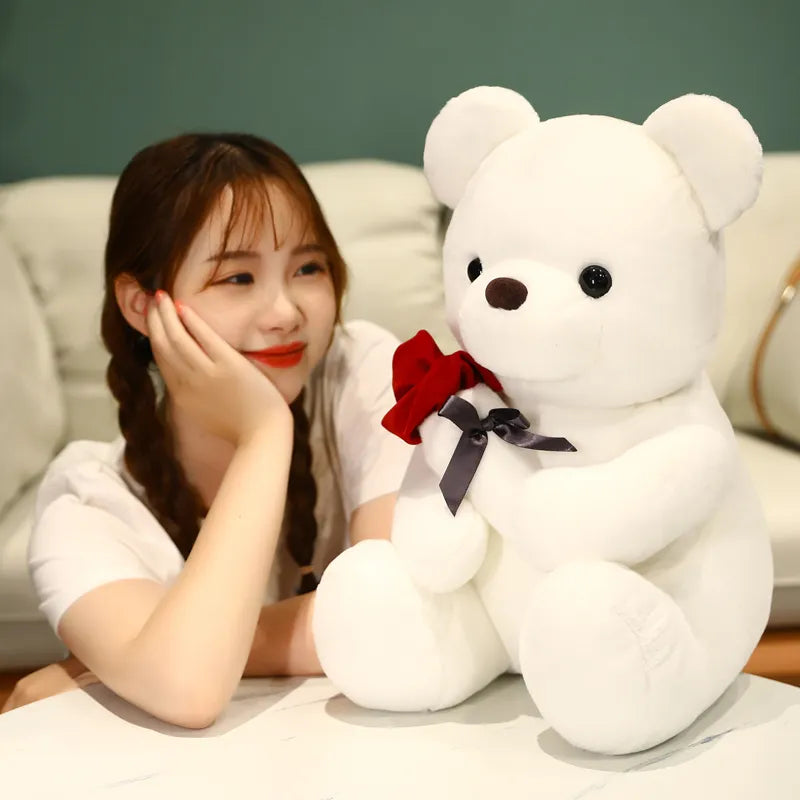 Adorable Teddy Bear Holding a Rose